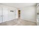 Bright room with an open door and lots of space for furniture at 467 Daffodil Ln, Mcdonough, GA 30253