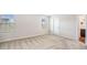 A bright bedroom with a double window and neutral carpet at 467 Daffodil Ln, Mcdonough, GA 30253