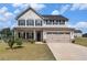 Beautiful two-story home with a two-car garage, classic design, and well-maintained landscaping at 467 Daffodil Ln, Mcdonough, GA 30253