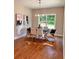 Dining room with modern furniture and a view of the outdoors through the window at 101 Red Oak Ln, Carrollton, GA 30116