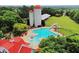 Aerial view showcases the community pool, waterslide, silos and landscaped grounds at 620 Egrets Landing Lot #68 Lndg, Covington, GA 30014