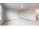 Spacious bedroom with neutral carpet and a large window for natural light at 620 Egrets Landing Lot #68 Lndg, Covington, GA 30014