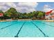 Large lap swimming pool with lane lines, lounge chairs, and beautiful clubhouse at 620 Egrets Landing Lot #68 Lndg, Covington, GA 30014