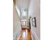 Elegant hallway with hardwood floors and chandelier at 335 Springs Crossing, Canton, GA 30114