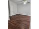 Bedroom featuring wood-look flooring, a ceiling fan, and neutral walls at 2438 Brianna Dr, Hampton, GA 30228