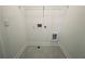 Laundry room with wire shelving and hookups at 3157 Moor View Rd # 34, Duluth, GA 30096