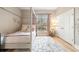 Charming bedroom with a four-poster bed, plush rug, and soft pink accents, creating a serene and inviting retreat at 6191 Talmadge Run, Acworth, GA 30101