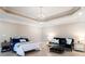 Comfortable bedroom with a decorative ceiling, ample space and natural light at 6191 Talmadge Run, Acworth, GA 30101