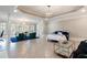 Spacious bedroom with seating area and large windows providing natural light and views at 6191 Talmadge Run, Acworth, GA 30101