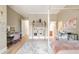 Elegant bedroom featuring stylish decor, a vanity area, and plush rug, offering a blend of comfort and sophistication at 6191 Talmadge Run, Acworth, GA 30101