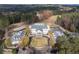 Expansive clubhouse aerial view surrounded by golf course and beautiful foliage at 6191 Talmadge Run, Acworth, GA 30101