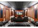 Home theater with plush seating, a large screen, and surround sound for an immersive experience at 6191 Talmadge Run, Acworth, GA 30101