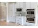 Bright kitchen with built-in stainless steel appliances, and lots of cabinet space at 6191 Talmadge Run, Acworth, GA 30101