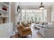 Spacious living room with hardwood floors, fireplace, and lots of natural light at 6191 Talmadge Run, Acworth, GA 30101