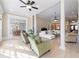 Spacious living area filled with sunlight, hardwood floors, with easy access to dining and other areas at 6191 Talmadge Run, Acworth, GA 30101
