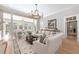 Spacious living room featuring hardwood floors, a fireplace, and lots of natural light at 6191 Talmadge Run, Acworth, GA 30101