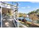 Spacious outdoor patio with lake views and a relaxing hammock swing at 6191 Talmadge Run, Acworth, GA 30101