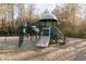 A spacious playground with multiple slides, climbing structures, and soft wood chip ground cover at 6191 Talmadge Run, Acworth, GA 30101
