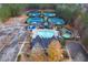Aerial view of a neighborhood clubhouse with a pool, waterslides, playground and tennis courts at 6191 Talmadge Run, Acworth, GA 30101