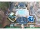 Aerial view of clubhouse pool, waterslide, splash pad, and playground at 6191 Talmadge Run, Acworth, GA 30101
