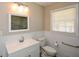 Clean bathroom, white vanity, and updated toilet at 175 Smith Ferguson Rd, Dallas, GA 30157