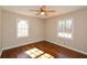 Bedroom with hardwood floors and two windows at 175 Smith Ferguson Rd, Dallas, GA 30157