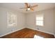 Spacious bedroom featuring hardwood floors and ceiling fan at 175 Smith Ferguson Rd, Dallas, GA 30157