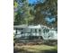 Front view of a white house with a red door and green ramp at 175 Smith Ferguson Rd, Dallas, GA 30157