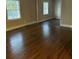 Spacious living area featuring gleaming hardwood floors at 175 Smith Ferguson Rd, Dallas, GA 30157