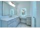 Elegant bathroom with quartz countertops and modern vanity at 211 Iroquois Ct, Covington, GA 30014