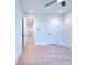 Bright bedroom with hardwood floors and ceiling fan at 211 Iroquois Ct, Covington, GA 30014