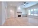 Bright and airy living room with hardwood floors and large windows at 211 Iroquois Ct, Covington, GA 30014