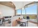 Small dining area with modern table and chairs, and a city view at 361 17Th Nw St # 2208, Atlanta, GA 30363