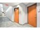 Building hallway with modern flooring and doors at 361 17Th Nw St # 2208, Atlanta, GA 30363