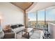 Spacious living room with hardwood floors and city view at 361 17Th Nw St # 2208, Atlanta, GA 30363