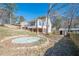 Landscaped backyard with a shed and an inground pool at 4706 Warrior Se Way, Mableton, GA 30126