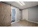 Basement bathroom with barn door and grey vanity at 4706 Warrior Se Way, Mableton, GA 30126