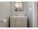 Basement bathroom with light grey vanity and modern fixtures at 4706 Warrior Se Way, Mableton, GA 30126