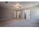 Large bedroom with ceiling fan and multiple entry points at 4706 Warrior Se Way, Mableton, GA 30126