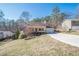 Charming ranch home with a deck and landscaped yard at 4706 Warrior Se Way, Mableton, GA 30126