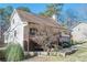 House exterior with a wraparound porch and landscaping at 4706 Warrior Se Way, Mableton, GA 30126