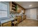 Bright kitchen with stainless steel appliances, granite countertops, and stylish backsplash at 4706 Warrior Se Way, Mableton, GA 30126