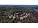 This aerial view shows a desirable property with beautiful landscaping and a tranquil location at 1560 Tapestry Rdg, Lawrenceville, GA 30045