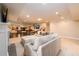 Basement with light grey couch, fireplace, pool table and rec area at 1560 Tapestry Rdg, Lawrenceville, GA 30045