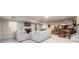 Basement with grey fireplace, comfortable couches, pool table, and games at 1560 Tapestry Rdg, Lawrenceville, GA 30045