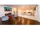 Finished basement with wood flooring and carpeted area for entertaining at 1560 Tapestry Rdg, Lawrenceville, GA 30045