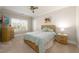 Bedroom with a bed, dresser, and ceiling fan at 1560 Tapestry Rdg, Lawrenceville, GA 30045