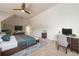 Bedroom with a ceiling fan, a desk, a large bed, and a blue and gray rug at 1560 Tapestry Rdg, Lawrenceville, GA 30045