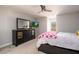 Bedroom with bed, dresser and television at 1560 Tapestry Rdg, Lawrenceville, GA 30045