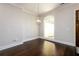 Versatile room showcasing hardwood floors, neutral walls, and natural light, perfect for customization at 1560 Tapestry Rdg, Lawrenceville, GA 30045